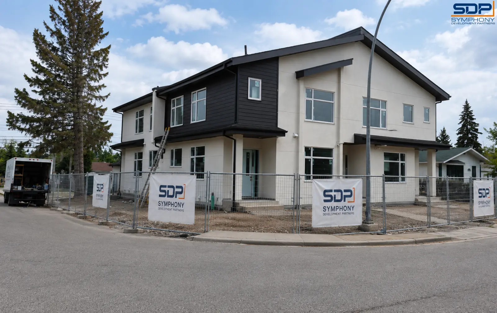 Fourplex exterior in Kingsland, Calgary
