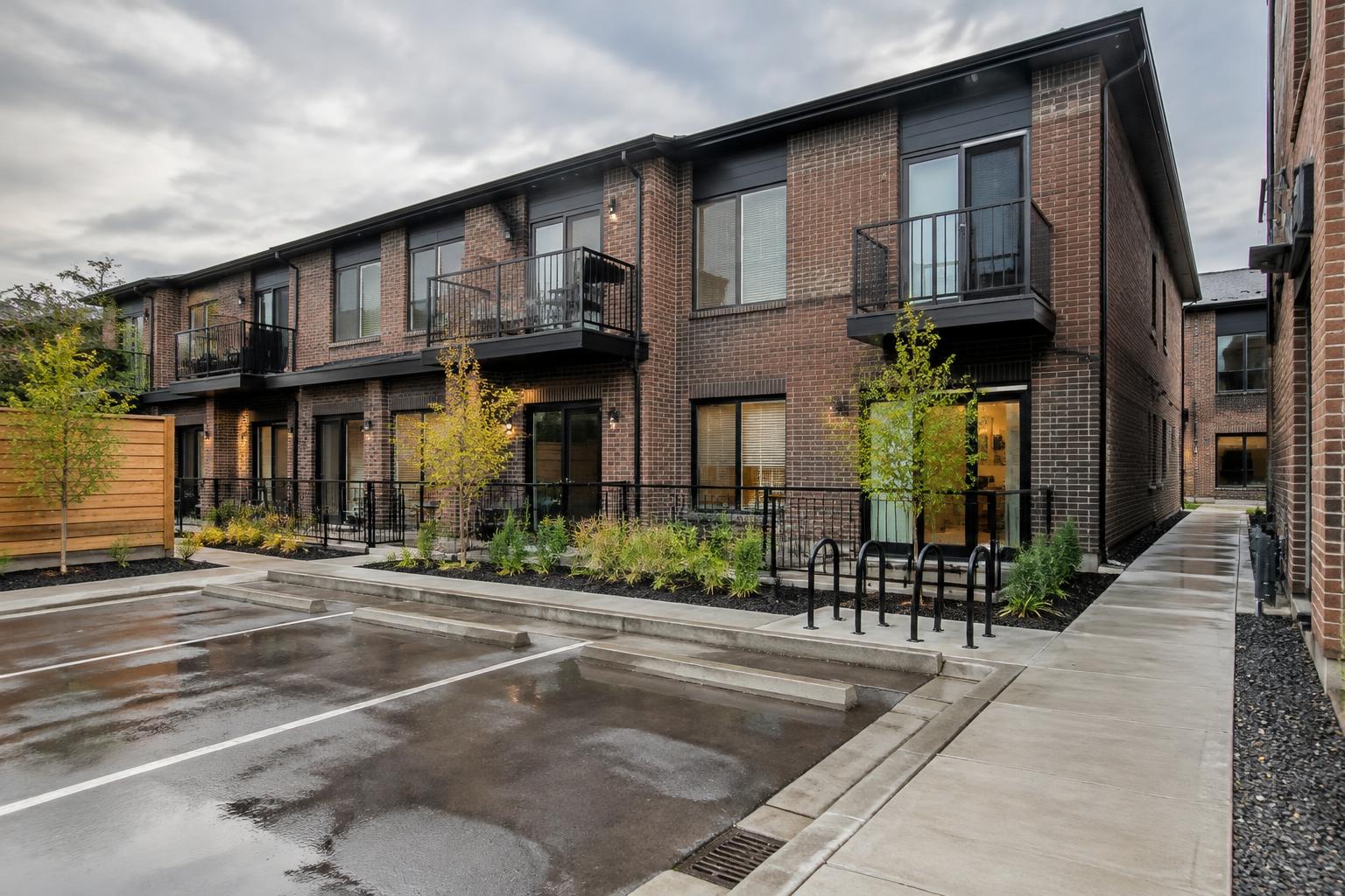 Rear courtyard, bicycle parking and patios at an eightplex
